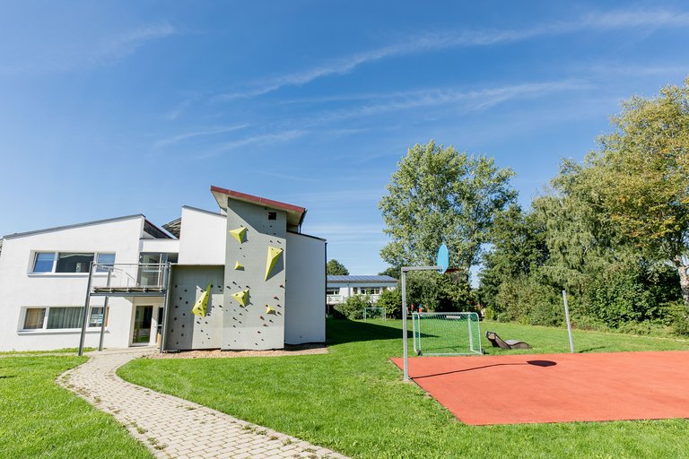 Climbing tower and sports field in the countryside