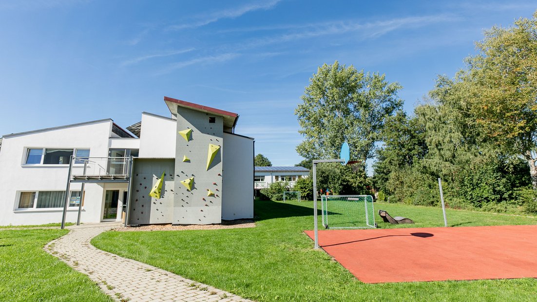Climbing tower and sports field in the countryside